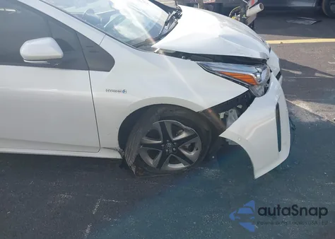 2021 Toyota Prius Xle z USA, uszkodzony, nr VIN JTDKAMFU7M3138534